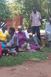 Child at Muira community meeting